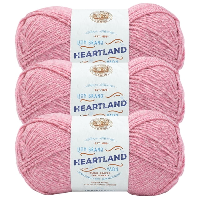 Lion Brand Yarn Heartland Yarn 3Pack in pink, showing three skeins of worsted weight acrylic yarn with white labels featuring the Lion Brand logo and Heartland branding, machine washable and suitable for knitting and crochet projects.
