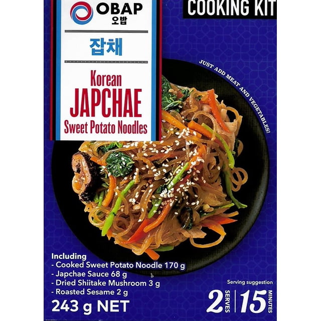 OBAP Korean Japchae Sweet Potato Noodles Cooking Kit with a black plate of cooked translucent sweet potato noodles stir-fried with carrots, green vegetables, dried shiitake mushrooms, and roasted sesame seeds, serving 2 in 15 minutes with no added MSG, suitable for quick Korean-style stir-fry meals.