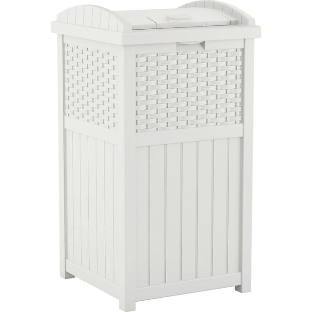 Suncast Outdoor Wicker Trash Hideaway in white, a 30-gallon resin refuse container with decorative wicker pattern panels, vertical slats, a latching lid to secure trash from pets, and a solid bottom panel for stability, suitable for patio and deck use and often used for outdoor recycling storage.