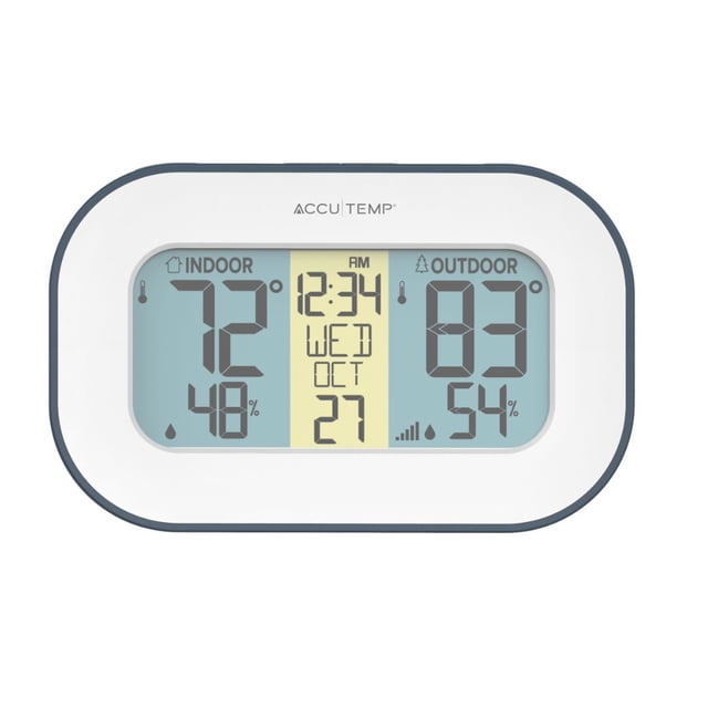Accutemp Climatic Wireless Temperature & Humidity Station front-facing LCD console showing indoor and outdoor temperature (°F/°C selectable), humidity percentage, indoor comfort level icon, time and calendar; tabletop or wall-mount placement, 330' wireless range, often used to monitor basements or indoor gardens.