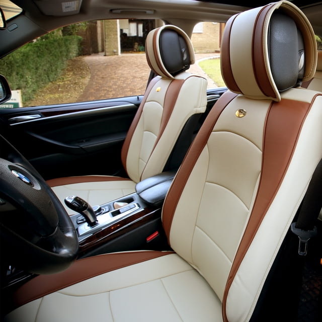 Housses de Siège en Cuir de Haute Qualité Ultra Confort pour Voiture, Camion, VUS, Fourgonnette - Ensemble avant Montré Installé sur les Sièges avant d'Un Véhicule. les Housses Présentent un design Bicolore en Similicuir beige et Brun avec un Ajustement Épuré et Semi-Personnalisé. Comprend Deux Housses de Siège Baquet avant et Deux Housses d'Appuie-tête. Conçues avec un Intérieur en silicone Antidérapant, une Ouverture à Glissière Supérieure et des Bords de Garniture Élastiques pour un Ajustement Serré. Compatibles avec les Sièges Traditionnels et Chauffants, et Offrent une Fonctionnalité de