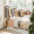 thumbnail image 2 of 2-Level Foldable Clothes Drying Rack with Height-Adjustable Wings, Free-Standing Laundry Rack Clothes Dryer, 33 Drying Rails, and Sock Clips, 2 of 6