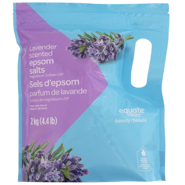 Equate Beauty Lavender Scented Epsom Salts in a 2 kg (4.4 lb) resealable blue and purple pouch featuring lavender flower images, containing magnesium sulfate USP for bath relaxation and stress relief in personal care.