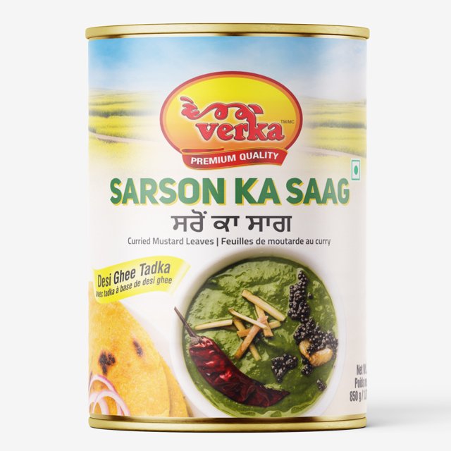 Verka Sarson Ka Saag, 850g can of traditional Punjabi curried mustard leaves with desi ghee tadka, featuring a green mustard leaf curry garnished with dried red chili, ginger strips, and black mustard seeds on the label, ready-to-eat and nutritious.