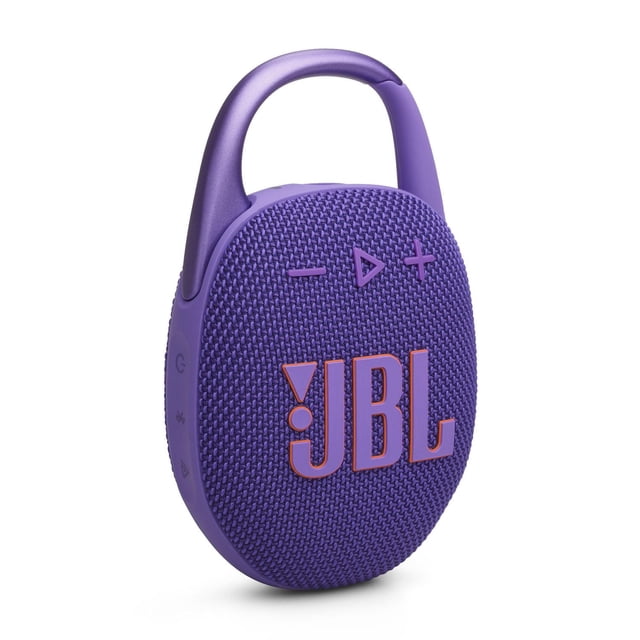 JBL CLIP 5 ultra-portable purple Bluetooth speaker with integrated carabiner, textured fabric grille with volume and play buttons, and JBL logo, shown angled on white background, ideal for outdoor use and pairing multiple speakers.
