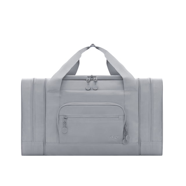 iFLY 20 Inch Water-Resistant Polyester Duffel Bag with Backpack Straps and Multiple Pockets, gray coated ripstop polyester duffel bag with padded webbing handles, front zip organizer pockets, side zip pocket with water-resistant PVC lining, detachable shoulder strap, backpack straps, and luggage pass-through sleeve, ideal for gym, travel, and organized daily use.