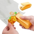 thumbnail image 2 of Portable Mini Sealing Machine 2024 Handheld Heat Vacuum Sealer 2 In 1 Bag Sealer And Cutter For Food Storage Bags Snacks Freshness Preservation, 2 of 5