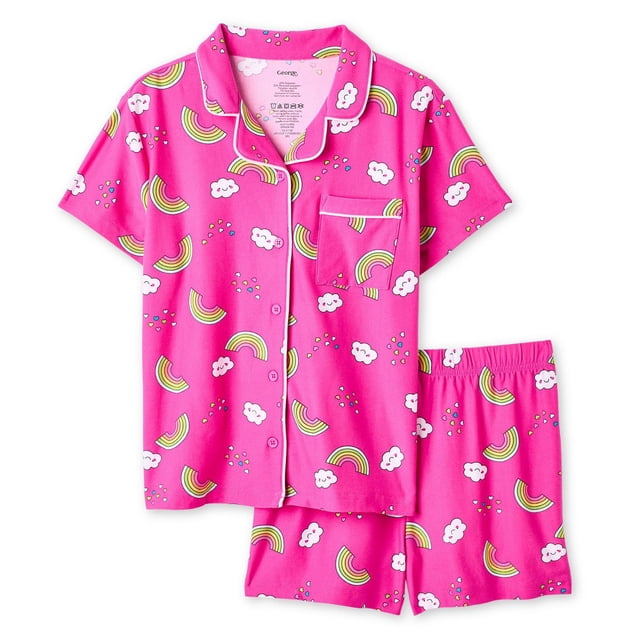 George Girls' Two Piece Lush Knit Pajama Set in bright pink with an all-over print of rainbows, white clouds, and small raindrops. The short-sleeve button-up shirt features a notch collar, chest patch pocket with piping detail, and matching elastic waistband shorts made from soft lush knit fabric suitable for sleepwear or casual loungewear.