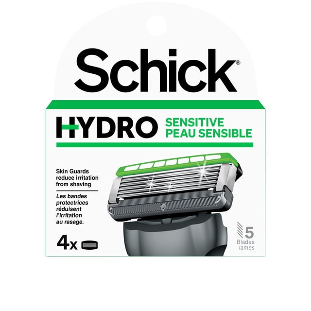 Schick Hydro Sensitive Skin Men’s Razor Refills package showing a close-up of a five-blade razor cartridge with green skin guards designed to reduce shaving irritation, bilingual English and French text, and a white background with green accents.