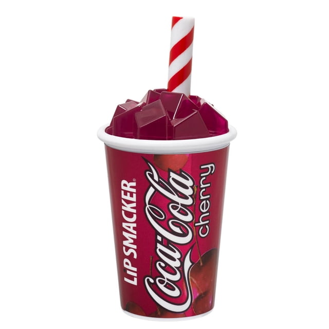 Lip Smackers Cherry Coke Cup Lip Balm shaped like a red Coca-Cola cherry fountain cup with a white rim and red-and-white striped straw, topped with a dome-shaped lip balm resembling ice cubes, offering flavored hydration.
