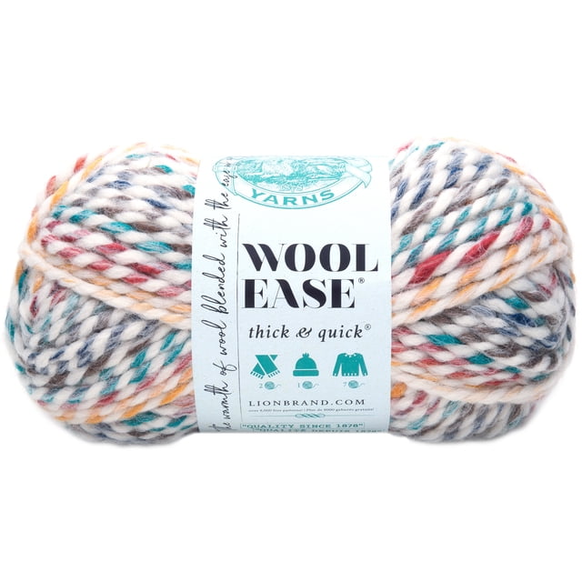 Lion Brand Laine Épaisse et Rapide Wool-Ease Hudson Bay #6 Super Volumineuse en Mélange d'Acrylique et de Laine, Écheveau de Fil avec Brins Torsadés Multicolores en Blanc, Rouge, Sarcelle, Marine et orange, 170 g et 97 m, Montré en Gros Plan avec Étiquette Indiquant l'Entretien Lavable à la machine et l'Adéquation pour des Projets de Tricotage Rapide comme des Écharpes, des Tuques et des Chandails.