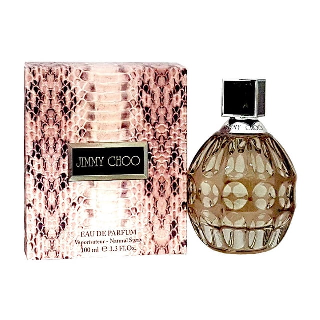 Jimmy Choo By Jimmy Choo Eau De Parfum Spray 3.4 oz, featuring a 100 ml bottle with a textured, rounded design and a sleek black cap. The packaging includes a pink snakeskin-patterned box with the Jimmy Choo logo prominently displayed.