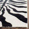 thumbnail image 3 of Safavieh Cambridge 26" X 8Hand Tufted Wool Rug in Ivory and Black, 3 of 10