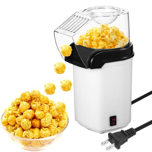 Popcorn Machine Electric Hot Air Popcorn Maker Home Air Popper with US plug, designed for countertop use. Features a compact white body with black accents and hot air technology for oil-free popcorn. Popcorn is shown spilling into a clear bowl. Includes a measuring cup integrated into the lid for precise ingredient measurement. A visible power switch and attached cord with a US plug are included.