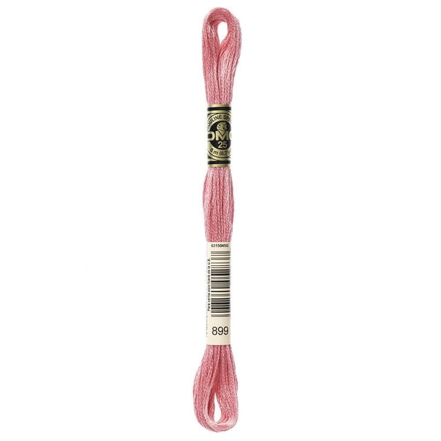 DMC Pink Cotton 6 Strand Floss 8m showing a skein of soft pink embroidery thread made from 100% long staple Egyptian cotton with double mercerized sheen, wrapped with black and gold DMC label and white barcode tag, ideal for cross-stitch, needlepoint, and scrapbooking.