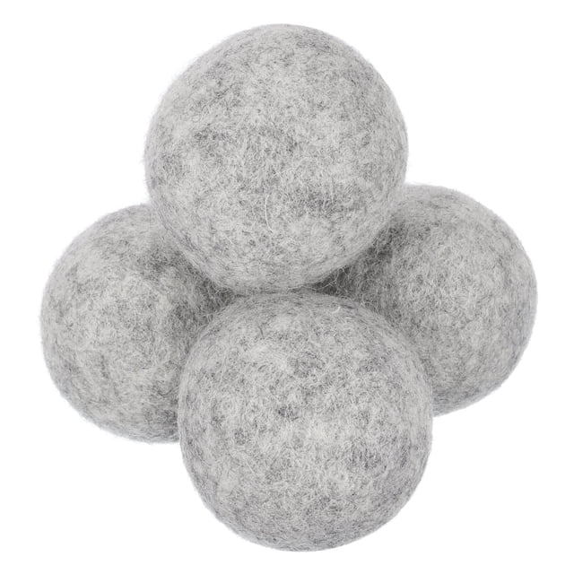 Unique Bargains 4 Packs Dryer Balls, 2 Inches Wool Dryer Balls for Dryer Laundry, Light Grey. A close-up view of four light grey wool dryer balls arranged in a cluster. Made of natural wool, these balls are free of dyes, fragrances, and chemicals, suitable for sensitive skin and reusable over a thousand times. A sustainable alternative to dryer sheets, ideal for reducing drying time, preventing static, and minimizing wrinkles in laundry.
