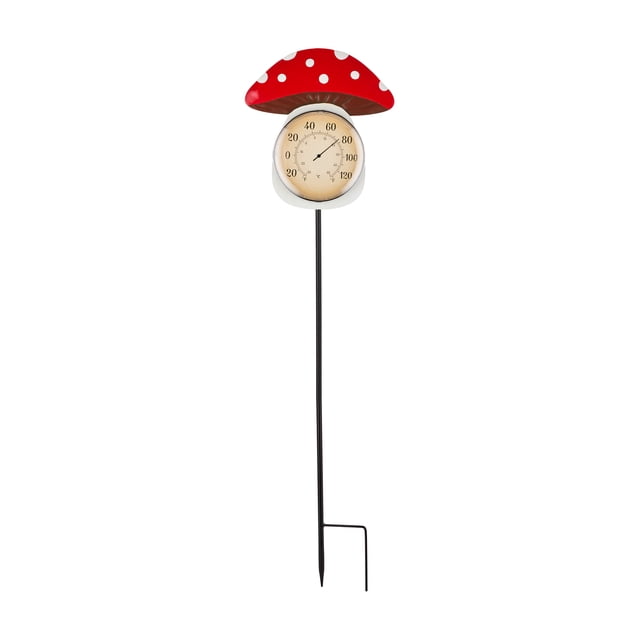 Mainstays Solar Mushroom Thermometer Stake with a red and white polka dot mushroom cap, an easy-to-read round thermometer face displaying Fahrenheit temperatures, and a black metal stake for outdoor garden or lawn placement.