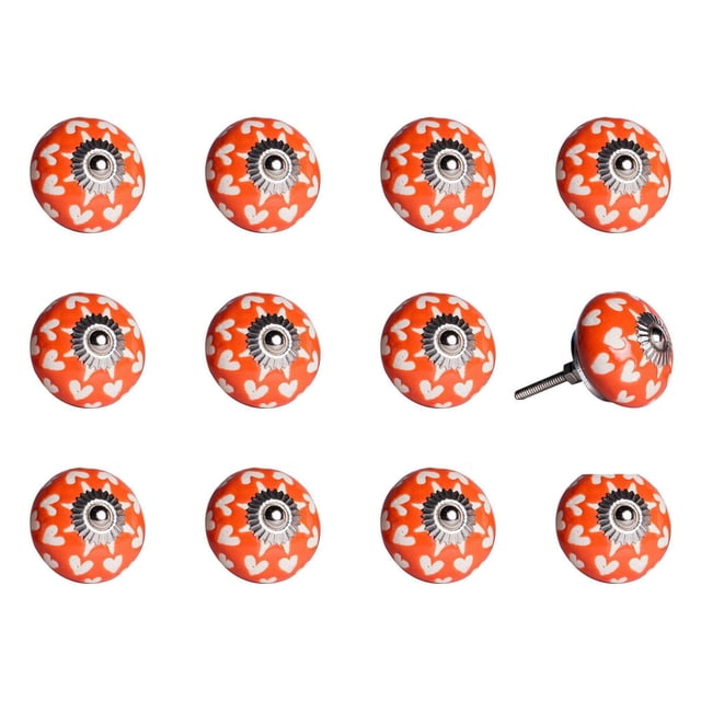 KNOB-IT vintage handpainted ceramic knobs 12-pack featuring round orange cabinet knobs with white heart patterns and silver metal centers with bolts, arranged in a grid on white background, ideal decorative hardware for drawers and cupboards, bolts can be trimmed to size.