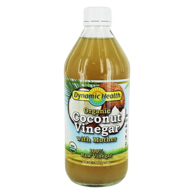 Dynamic Health Organic Coconut 100% Raw Vinegar with Mother in a 16 fl. oz. (473 mL) glass bottle. The label features a coconut image, green accents, and certifications such as USDA Organic. This unpasteurized vinegar is made from raw coconut tree sap and contains the natural Mother of vinegar.