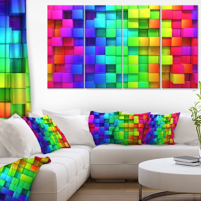 Design Art Rainbow of Colorful Boxes Canvas Print is a five-panel gallery wrapped canvas featuring a 3D cube pattern in vibrant rainbow colours. It hangs above a white sectional sofa with matching pillows and a throw blanket in the same design, adding modern wall art to a living room. This canvas print is ready to hang and ideal for brightening home or office décor.