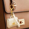 thumbnail image 1 of Stylish Leather Key Chain Pouch Handle Strap Coin Purse Bag Pendant Earphone Case Red Envelope, 1 of 5
