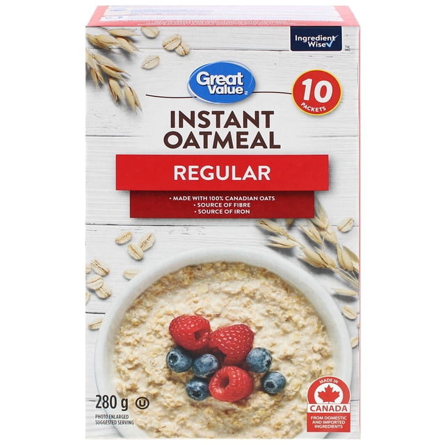 Great Value Regular Instant Oatmeal box with 10 packets made from 100% Canadian oats, a source of fibre and iron, showing a bowl of oatmeal topped with raspberries and blueberries, suitable for quick breakfasts or overnight oats.