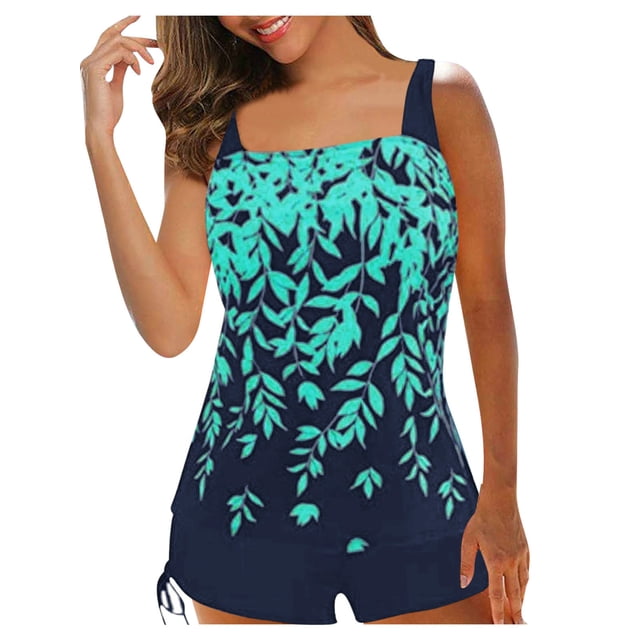 Gupgi Plus Size Swimsuits for Women 2pcs Bathing Suits Tankini Padded Tops with Swim Shorts. The image shows a sleeveless tankini set featuring a leaf print in lake blue on the top with adjustable straps and solid navy blue drawstring shorts. Made of polyester, this swimwear is soft, breathable, and elastic. Suitable for summer, beach outings, and pool parties. Available in sizes S to 3XL.