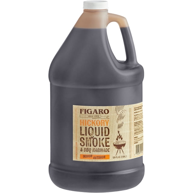 Figaro 1 Gallon Hickory Liquid Smoke and Marinade in a sturdy plastic jug with a beige label showcasing bold text and barbecue-themed graphics. Perfect for enhancing meats, vegetables, and homemade BBQ sauces with slow-roasted hickory flavor. Suitable for use in marinades and cooking sauces.