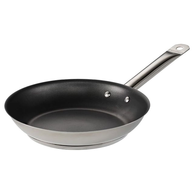 Tramontina Tri-Ply Base 10 in Stainless Steel Fry Pan with Nonstick Interior, featuring a durable nonstick coating for easy cooking and cleaning. The tri-ply base ensures even heat distribution, and the pan is compatible with induction, gas, electric, and ceramic glass stovetops. It has a sleek mirror-polished finish and is oven-safe up to 450°F (232°C). Ideal for frying, searing, and sautéing single portions, this pan is part of the Tramontina Gourmet Collection and is dishwasher-safe.