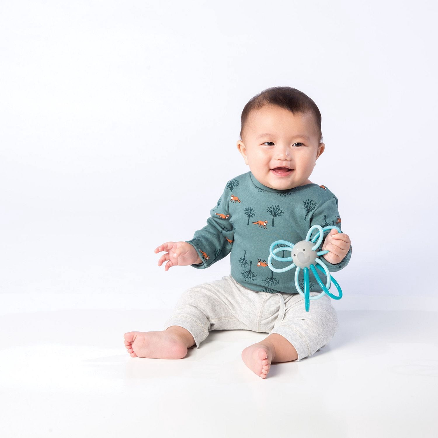 Manhattan Toy Winkel Elephant Rattle And Sensory Teether Baby Toy