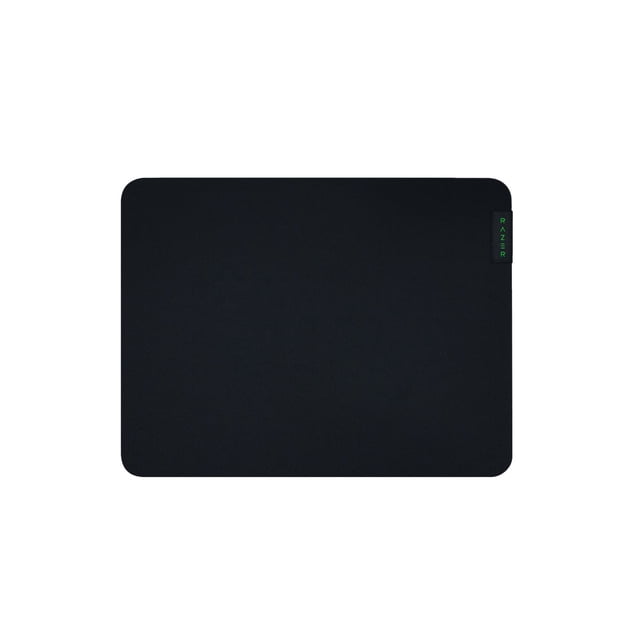 Razer Gigantus V2 Mousemat (M) (PC) shown from above, featuring a rectangular black textured micro-weave cloth surface with rounded corners and a thick rubber foam base. It has an anti-slip bottom and a small black tag with the green Razer logo on the right edge, designed for precise mouse control and wrist cushioning, also suitable as a desk surface protector.