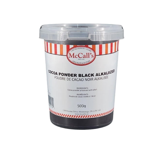 McCall's Black Alkalized Cocoa Powder in a 500g container with a clear lid and striped red and white branding. This ultra-dutched cocoa delivers a deep matte black color and smooth, earthy chocolate flavor, perfect for baking chocolate recipes like cakes, cookies, and decorations.
