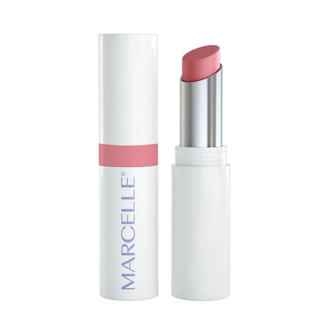 Marcelle Lip Loving Colour & Caring Oil-in-Stick Lipstick with white tube and pink band, cap beside the open stick showing creamy, semi-sheer pink lipstick with slanted tip. Vegan formula hydrates and plumps lips with hyaluronic acid and tsubaki oil.