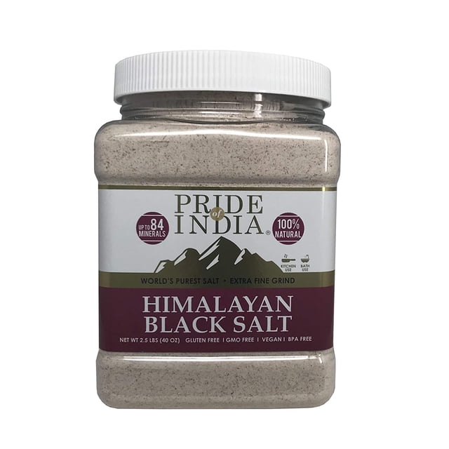 Pride Of India Himalayan Rock Salt in a 2.5-pound jar featuring pure Himalayan black salt with an extra fine grind. The jar highlights up to 84 natural minerals, gluten-free, GMO-free, vegan, and BPA-free attributes. Ideal for Indian and South Asian cooking, seasoning, and therapeutic bath use.