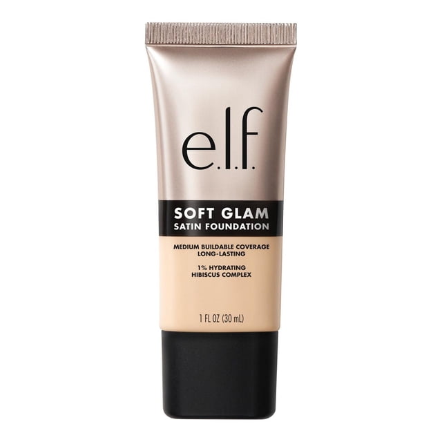 e.l.f. Cosmetics Soft Glam Satin Foundation in a 30 ml beige tube with a matte taupe cap, offering medium buildable coverage and a breathable, long-lasting liquid foundation infused with 1% hydrating hibiscus complex, ideal for dry, oily, and combination skin.