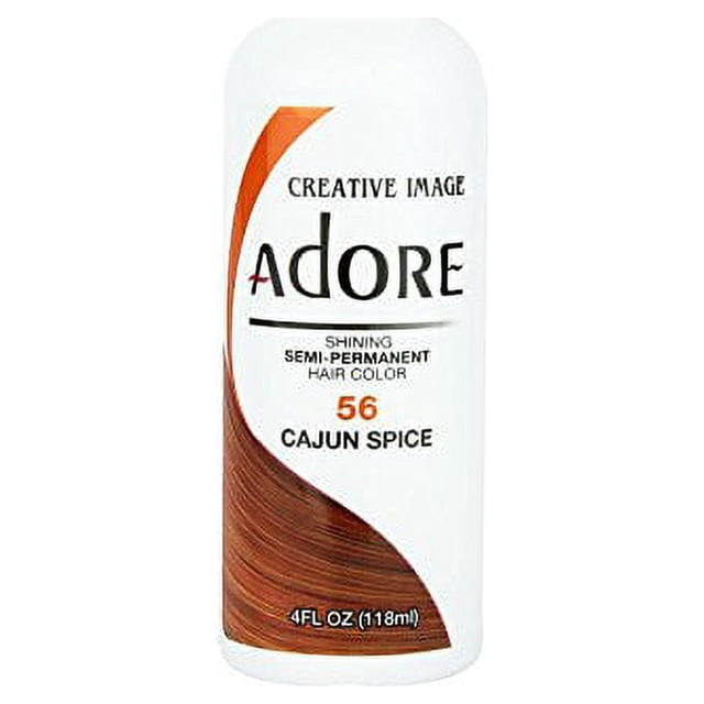 Adore Coloration Semi-Permanente pour Cheveux dans la Teinte 56 Cajun Spice, une Bouteille de 4 fl oz (118 ml). le Produit Présente un Ton Orange-Brun Vif et Est Formulé Sans Ammoniaque, Peroxyde Ni Alcool. Conçu pour Rehausser l'Éclat et Laisser les Cheveux Doux et Soyeux, Il Convient à la Coloration Temporaire des Cheveux.