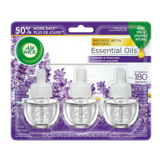 Air Wick Plug-in Air Freshener Scented Oil Refills Lavender & Chamomile 3 Refills in clear glass bottles with white caps on lavender-themed packaging, infused with natural essential oils, providing up to 180 days of continuous fragrance, ideal for use in various rooms.