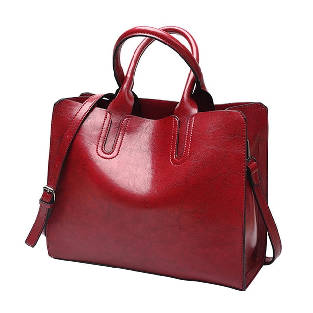 Elegant Womens Leather Handbag Zipper Closure Big Capacity Purse Bag Satchel Red. A fashionable red satchel crafted from durable PU leather with a smooth texture, featuring sturdy hardware, dual handles, and an adjustable shoulder strap. The bag offers a large capacity with multiple pockets for organizing essentials like a wallet, phone, cosmetics, and umbrella. Ideal for travel, shopping, work, or casual outings.