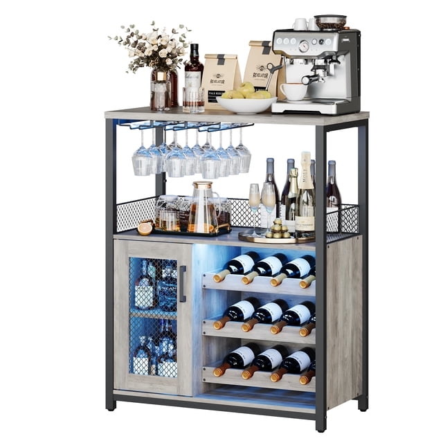 Wine Bar Rack Cabinet with LED Light, Adjustable Shelves Coffee Bar Cabinet with Mesh Door and Baffle Design, 36 in Tall Small Liquor Bar Cabinet for Home, Kitchen, Dining Room, Grey. The cabinet features a grey finish with a sturdy metal frame and waterproof MDF board. It includes a wine glass holder for up to 9 glasses, adjustable wine racks, and a ventilated cabinet with a mesh door. The LED light strip offers customizable colors and modes, enhancing the ambiance. The compact design measures 27.2 inches wide, 13.8 inches deep, and 36.2 inches tall, making it ideal for small spaces. Adjustable feet ensure stability on uneven surfaces.