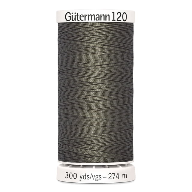 Gutermann 120 100% polyester all purpose thread spool in grey, tightly wound on a white plastic bobbin labeled with brand and length 300 yards (274 meters), suitable for machine and hand sewing various fabrics including cotton and synthetics.