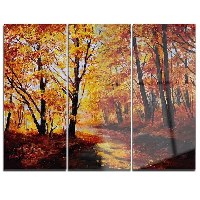 Design Art Forest in Autumn Multipanel Landscape Metal Wall Art featuring a three-panel aluminum print with a high gloss finish. It depicts a forest path with trees in yellow, orange, and red autumn foliage. Mounted on a wood subframe for a floating effect, this ready-to-hang metal wall art is made in Quebec, Canada and suits modern home or office décor, often used to add seasonal nature themes indoors.