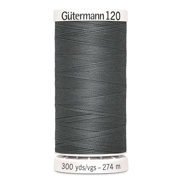 Gutermann 120 100% polyester all purpose thread spool in grey, tightly wound on a white plastic spool labeled with brand and length of 300 yards (274 meters), suitable for machine and hand sewing woven, knit, and synthetic fabrics.