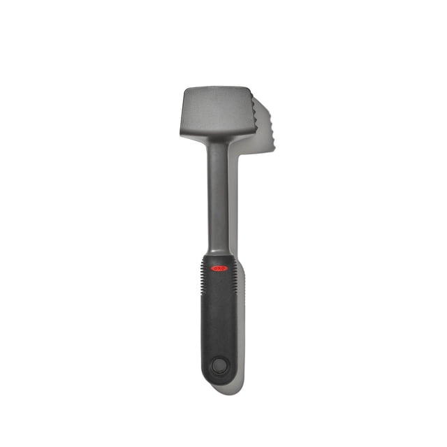 OXO SoftWorks Meat Tenderizer with a gray angled head featuring pyramid-shaped teeth on one side and a smooth flat surface on the other, and a black soft non-slip handle with a red OXO logo, shown from a top-down view on a white background, suitable for tenderizing and flattening meat cuts.