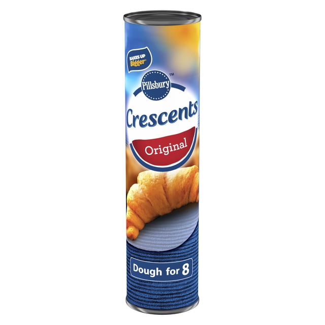 Pillsbury Croissants Pâte Réfrigérée Originale en Grande Boîte Cylindrique avec Dégradé Bleu et Jaune, Présentant un Croissant Cuit sur une Assiette et un Texte Indiquant la Pâte pour 8 Pcs, Idéale pour des Recettes Polyvalentes, des hors-D'œuvre aux casseroles et aux desserts.