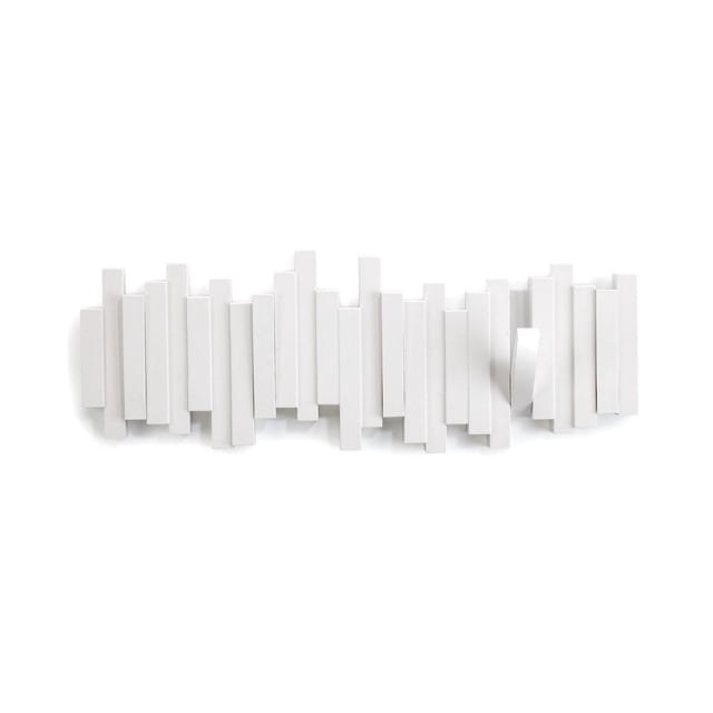 Umbra Sticks Wall Mounted Coat Rack in white featuring a modern sculptural design with vertical rectangular bars and five flip-down hooks, one hook flipped down, made from recycled plastic, suitable for organizing coats and accessories in home or office.