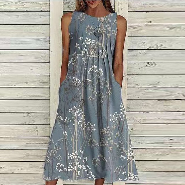 SMihono Robe Bohème d'Été pour Femmes Grande Taille Mode Robe Sans Manches à Col en V Décontractée à Imprimé avec Poches en Gris. Cette Robe Légère en polyester Présente un Charmant Imprimé floral, un design Sans Manches et des Poches Pratiques. Parfaite pour les occasions Décontractées comme les Sorties à la Plage, les Mariages Ou le Port Quotidien au Printemps et en Été. Convient aux Femmes de Grande Taille et Idéale pour Atteindre un style Bohème.