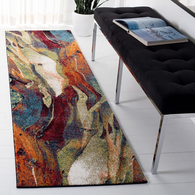 SAFAVIEH Glacier Aleesha Tapis Coureur Abstrait avec un Doux Tufté Mécaniquement, Présentant un Motif Abstrait Marbré vibrant en Tons Rouge, orange, Bleu, Vert et Crème, Posé sur un Plancher Blanc à Côté d'Un Banc Capitonné Noir avec des Pattes Chromées et un Livre Ouvert, Convenant à la Déco Contemporaine de Couloir Ou d'Entrée.