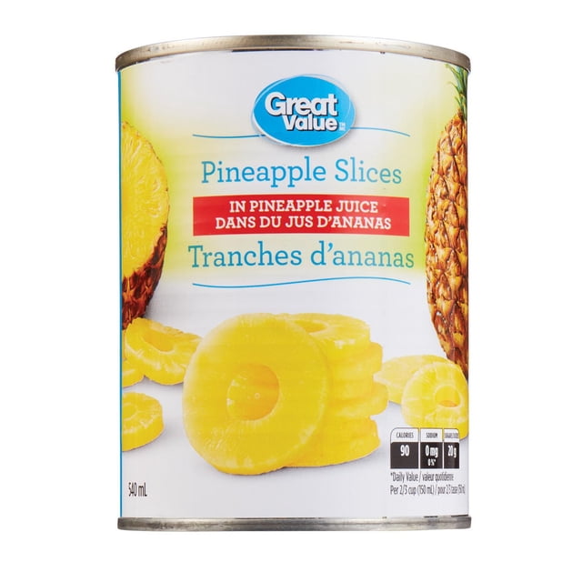 Great Value Pineapple Slices canned fruit in pineapple juice, shown in a 540 mL can with bright yellow pineapple rings on the label, featuring bilingual English and French text and the Great Value logo, ideal for desserts or grilling.