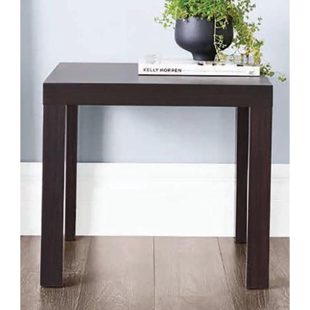 Hometrends End Table in espresso finish with a simple modern rectangular design and four straight legs, ideal as a side or accent table in living room furniture, shown with a black planter and book on top, lightweight and easy to assemble.