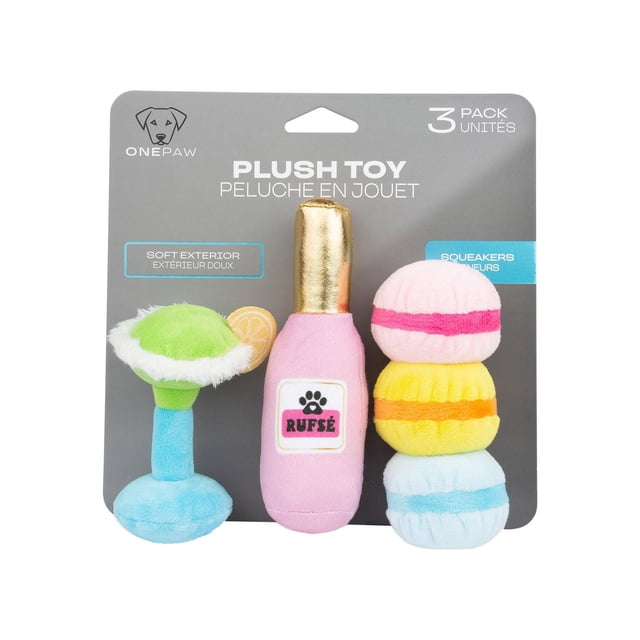 One Paw Girls Night Set Dog Plush Toy 3-pack includes a soft plush margarita glass with green top and blue base, a pink champagne bottle with gold neck and 'Rufsé' label, and three stacked macarons in pink, yellow, and blue, each about 6 inches tall with built-in squeakers for interactive dog play.